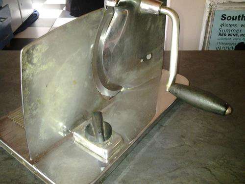 Vintage Bread, meat slicer with adjustable knob for blade. A good collectors item!