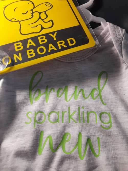 New born baby grow with free baby on board sign