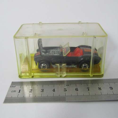1982 Hot Wheels Cobra toy car in plastic case - scale 1/64
