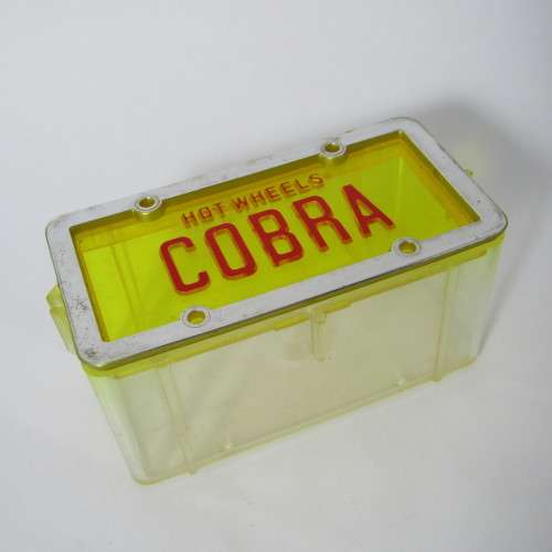 1982 Hot Wheels Cobra toy car in plastic case - scale 1/64