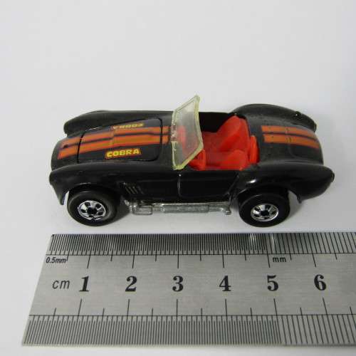 1982 Hot Wheels Cobra toy car in plastic case - scale 1/64