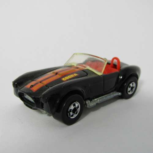 1982 Hot Wheels Cobra toy car in plastic case - scale 1/64