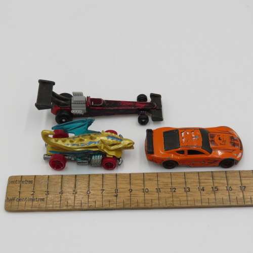 Lot of 7 Hot Wheels toy cars - Well used