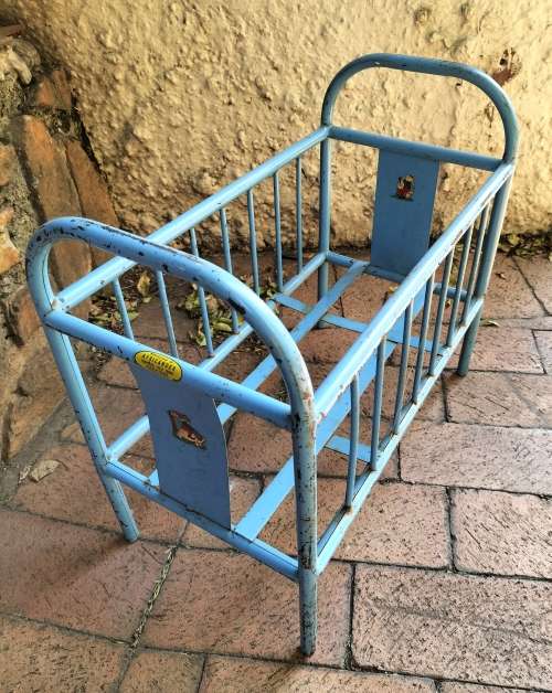 Vintage collectable doll metal cot