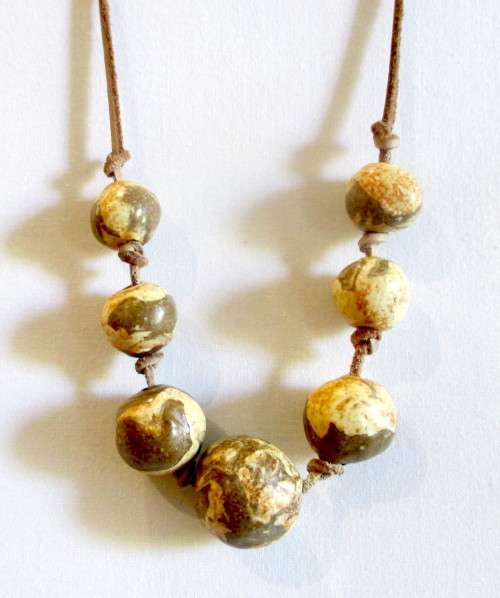 Vintage Ethnic Clay Bead Neclace on leather string. 75cm.