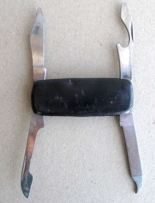vintage Stainless Steel Pocket Knife. Leather Covered. As per Photo.