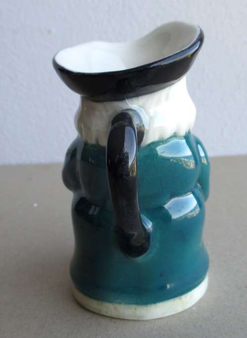 Vintage Porcelain Colonial Sailor Character mug small. 90mm high.