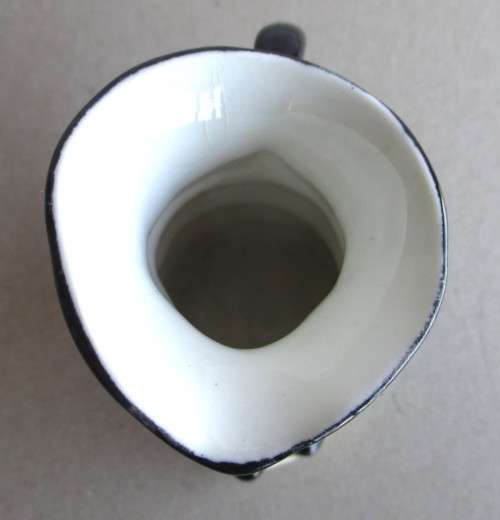 Vintage Porcelain Colonial Sailor Character mug small. 90mm high.