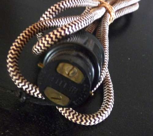 Vintage Electrical cord with light connection.