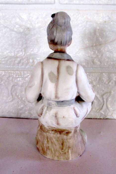 Lovely Vintage Unglazed Porcelain Figurine. 140mmhigh.