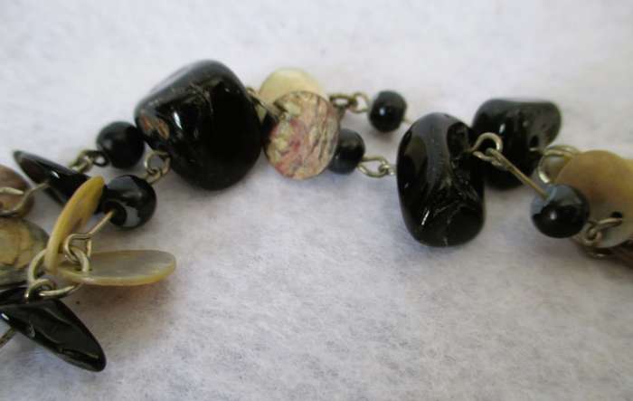Lovely Mother of Pearl discs with black semi precious stone necklace. 90cm.
