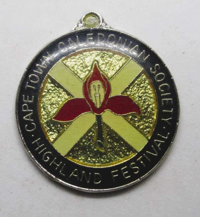 Vintage Cape Town Caledonian Society Highland festival enameled.