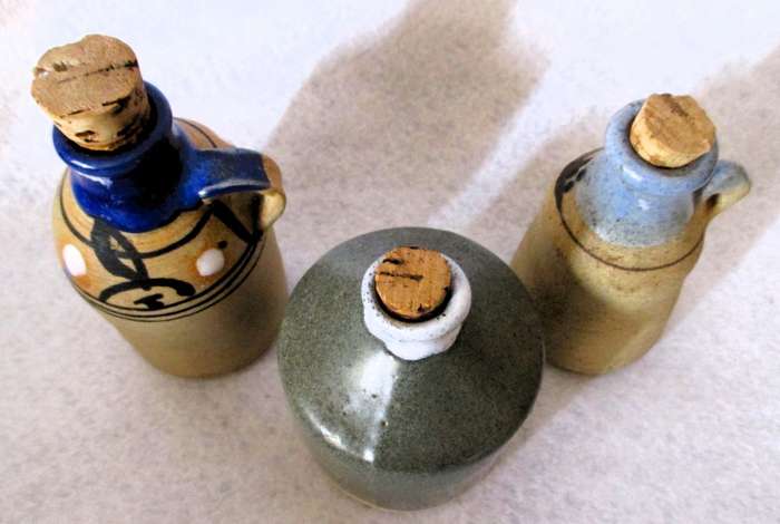 Lot of 3 Vintage Stoneware Jugs with cork. bigger 120mm high.