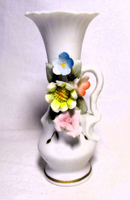 Two Vintage unglazed ceramic decor items. Delicate flowers on Vase and honey pot. Bilbao.
