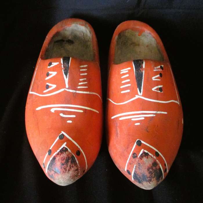 Dutch wooden clogs used as a decorative element. 22cm long.