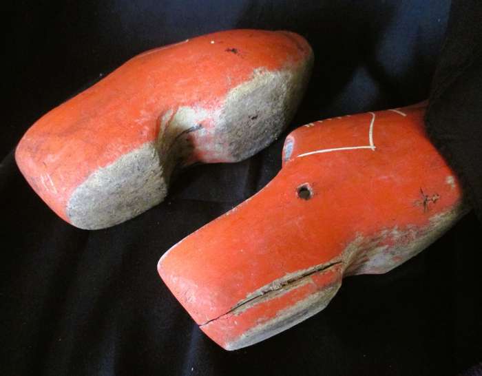 Dutch wooden clogs used as a decorative element. 22cm long.