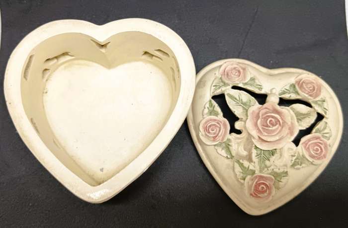 Heart shape porcelain jewelry box and photo frame with cherub baby.