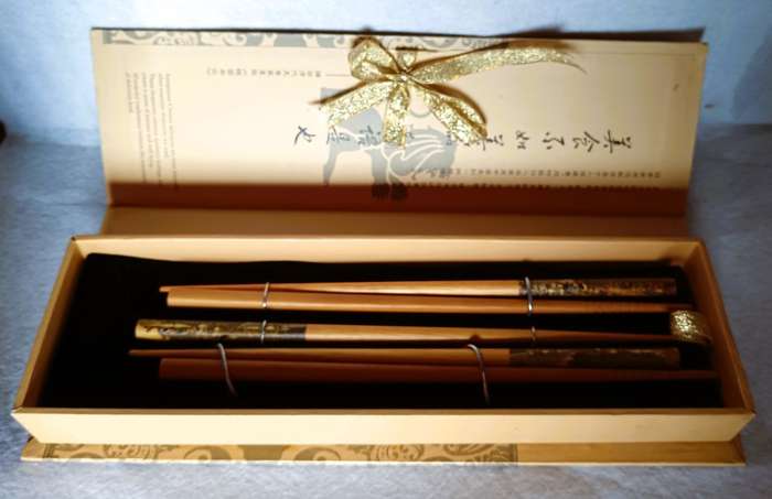 Lot of 5 Maxwell Williams designer chopsticks, in box.