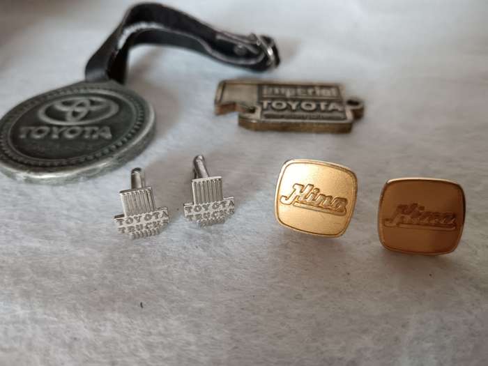 Lot of Vintage Toyota cuff links and other memorabilia. As per photo.