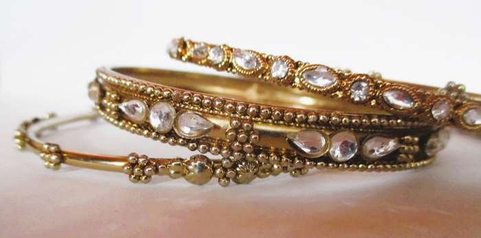 4 x Indian Traditional Ethnic Bangles.. Gold color with rhinestones.