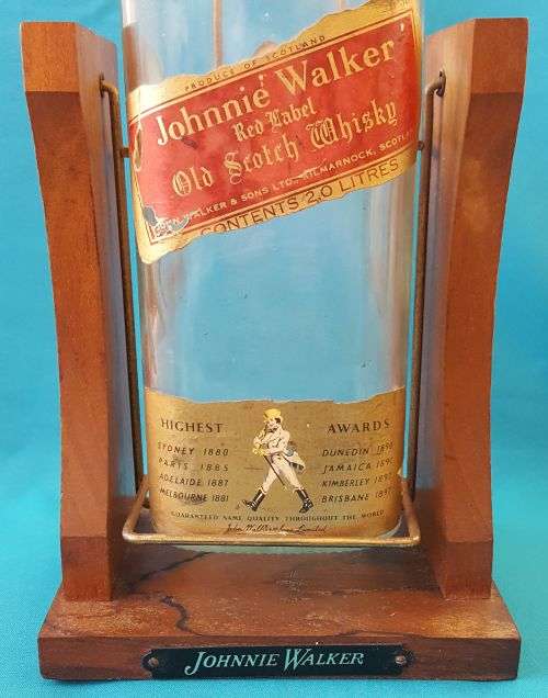 JOHNNIE WALKER (2L) BOTTLE ON WOODEN STAND
