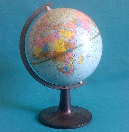 OLD TIN WORLD GLOBE, DEPICTING RHODESIA ETC. (1976)