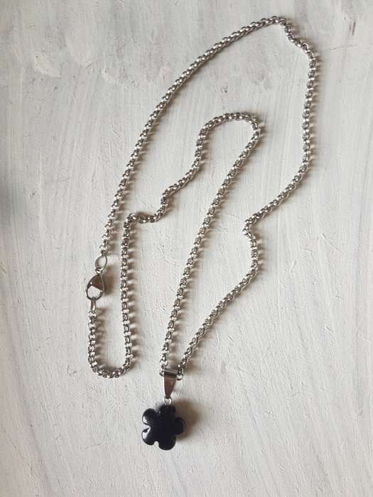 Stainless steel necklace with natural black onyx flower pendant