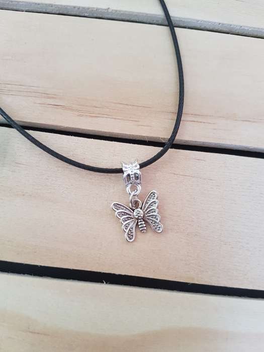 Black faux leather waxed cord necklace with butterfly pendant