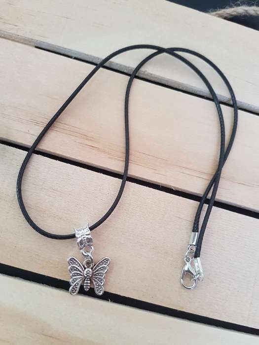 Black faux leather waxed cord necklace with butterfly pendant