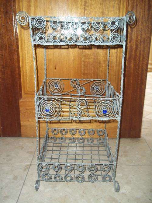 Decorative towel / toiletry holder