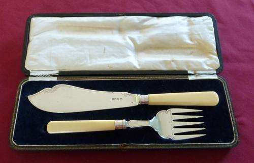 Boxed set of sterling silver and bone fish servers