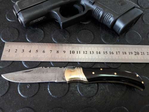 Handmade DAMASCUS  Folding Knife with Bull Horn handle scales. Crazy R1 start, No reserve.