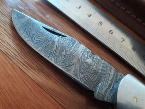 Handmade Damascus steel folding knife with WOODEN handle scales.
