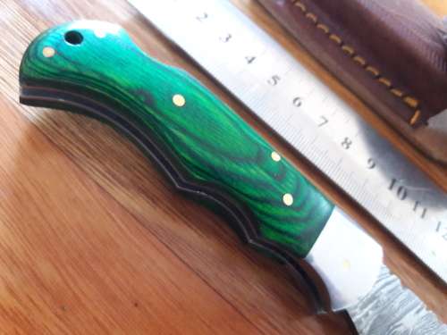Handmade Damascus steel folding knife with WOODEN handle scales.