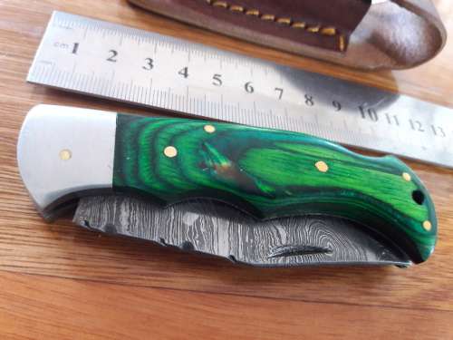 Handmade Damascus steel folding knife with WOODEN handle scales.