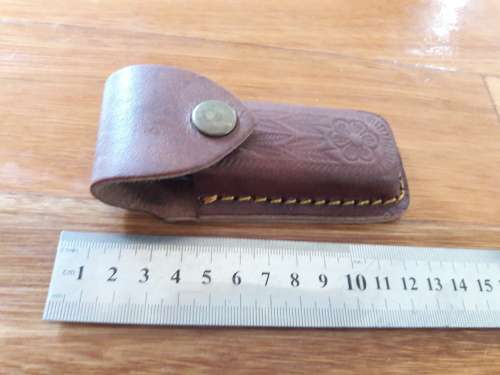 Handmade Damascus steel folding knife with WOODEN handle scales.