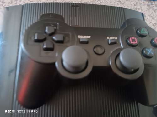 Sony Ps3 Superslim 500GB Console 2 x controllers