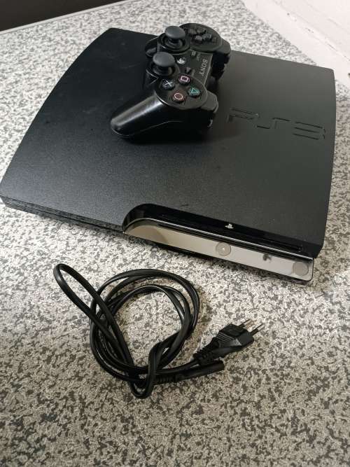 Ps3 Console 320GB -  5 games on system - not reading Discs**