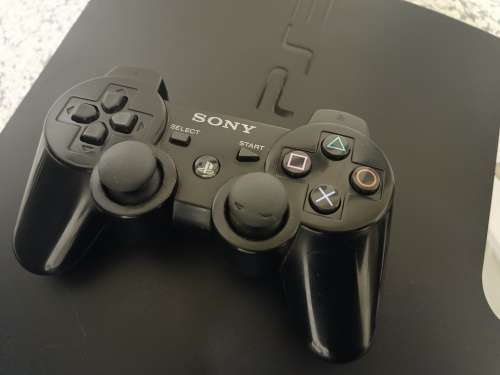 Ps3 Console 320GB -  5 games on system - not reading Discs**