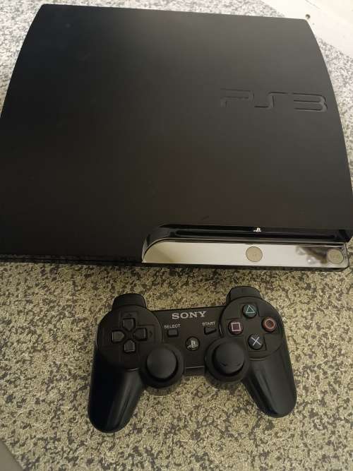 Ps3 Console 320GB -  5 games on system - not reading Discs**
