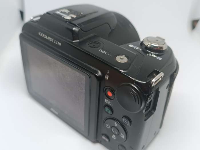 Nikon Coolpix L110 (marks on lens) - 12.1MP - 15x Zoom - Digital Camera