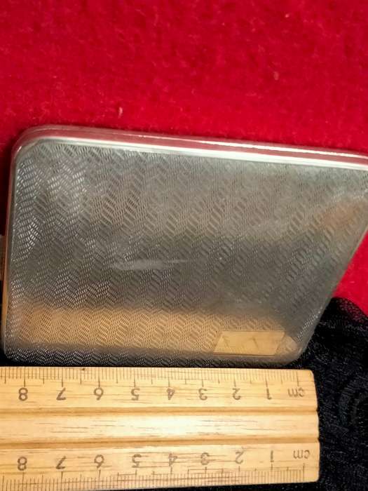 Cigarette case hinged  pattern fishermans rib engine turned decor silver tone metal