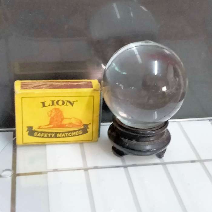 ORB glass flat bottom on oriental plinth Art GLASS one side Mary