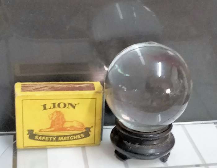 ORB glass flat bottom on oriental plinth Art GLASS one side Mary