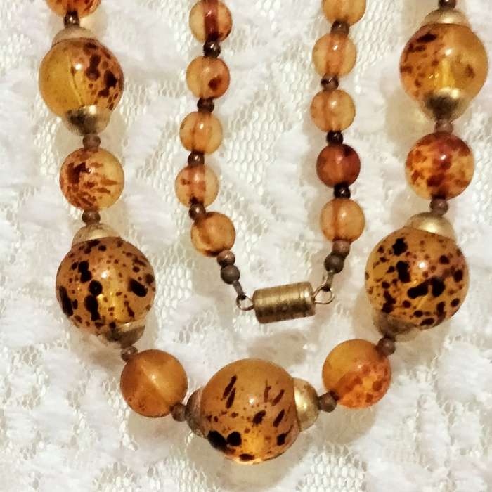 Necklace  AMBER graduating faux round beads+ small beads gold tone metal spacers + barrel clasp