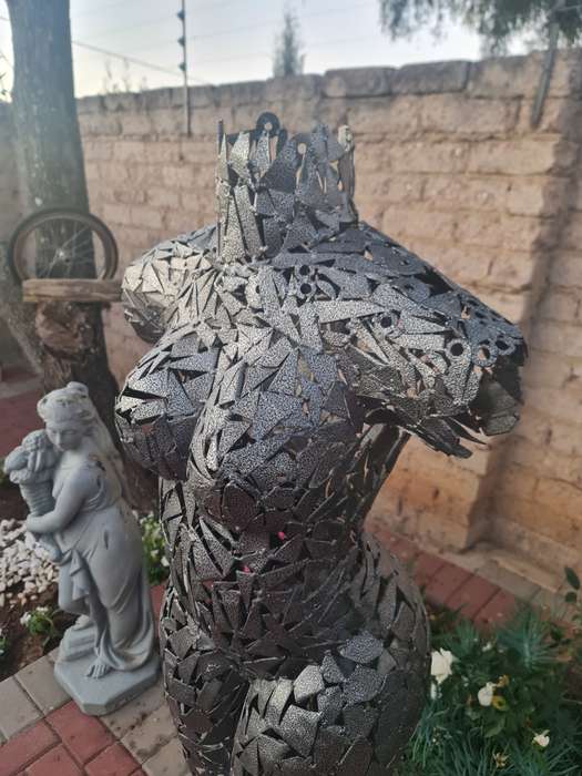 Hand Crafted Metal Female Torso Sculpture With a Metal Base