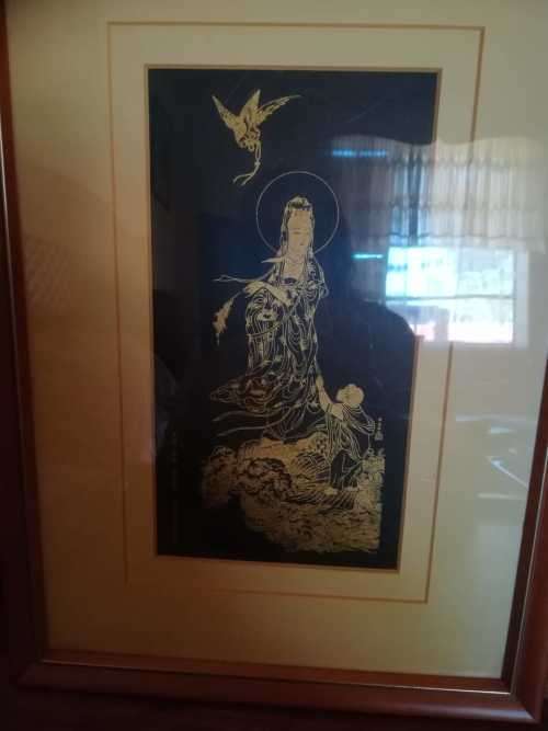 Framed Chinese Gold embossing on Black background.