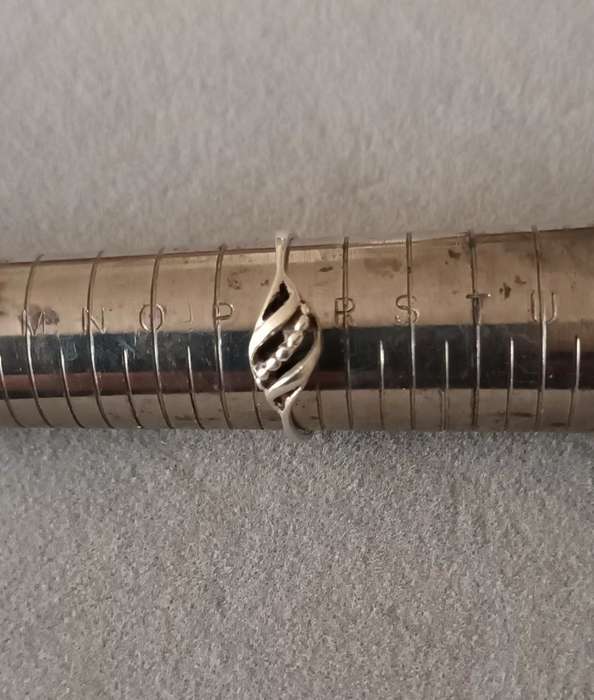 Sterling Silver Ring. 1.5g. Size Q.