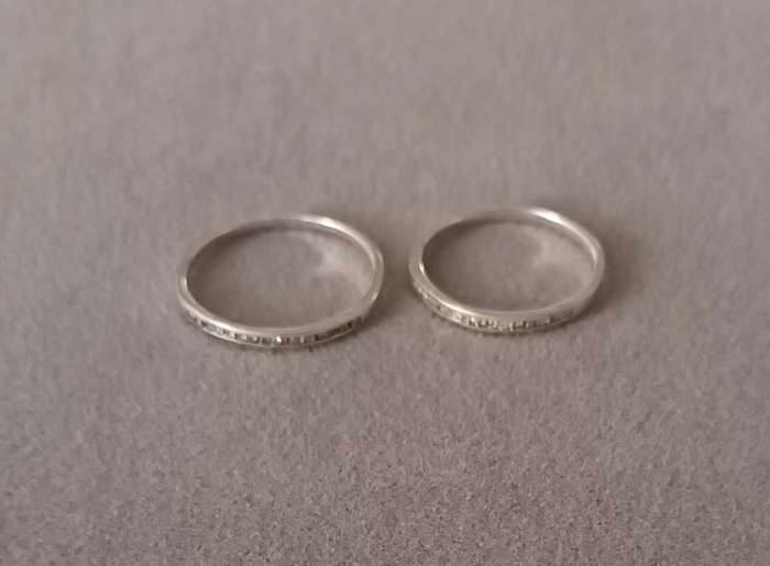 Sterling Silver Half Eternity Rings x2. 2.1g. Size N & size O.
