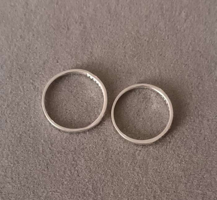 Sterling Silver Half Eternity Rings x2. 2.1g. Size N & size O.